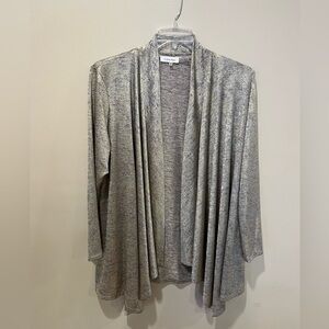 Calvin Klein Dress up any outfit with this beautiful open front draped cardigan